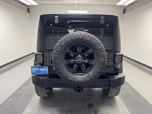 used 2014 Jeep Wrangler Unlimited car, priced at $22,129