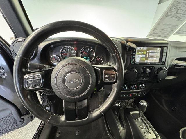 used 2014 Jeep Wrangler Unlimited car, priced at $22,129