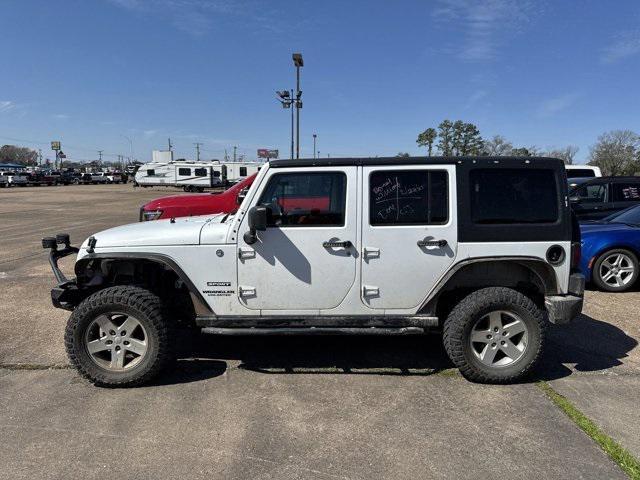 used 2013 Jeep Wrangler Unlimited car, priced at $13,658