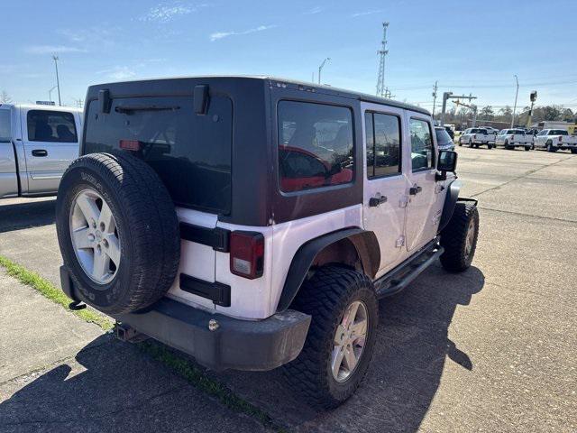 used 2013 Jeep Wrangler Unlimited car, priced at $13,658