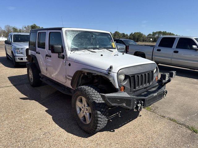 used 2013 Jeep Wrangler Unlimited car, priced at $13,658