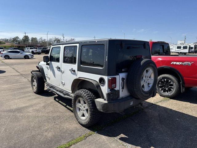 used 2013 Jeep Wrangler Unlimited car, priced at $13,658