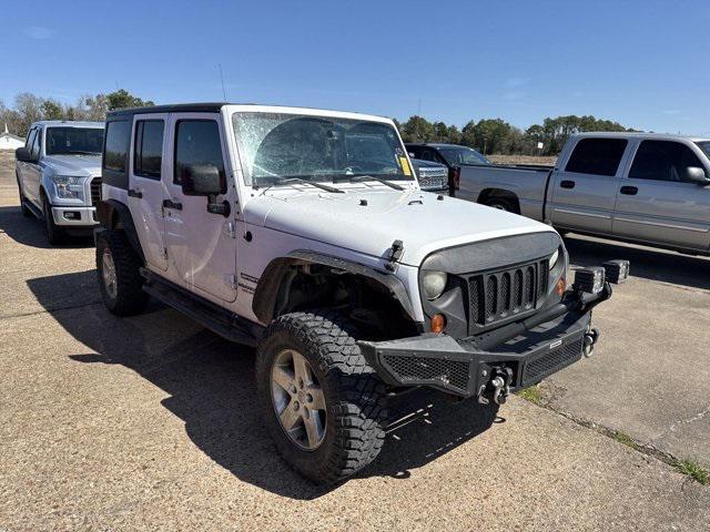 used 2013 Jeep Wrangler Unlimited car, priced at $13,658