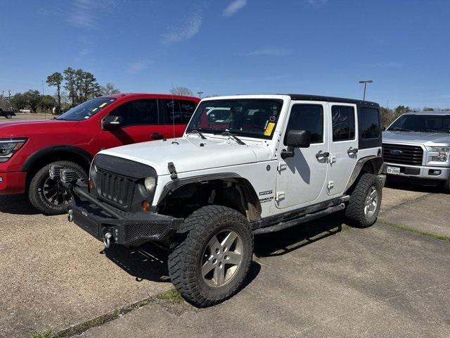 used 2013 Jeep Wrangler Unlimited car, priced at $13,658