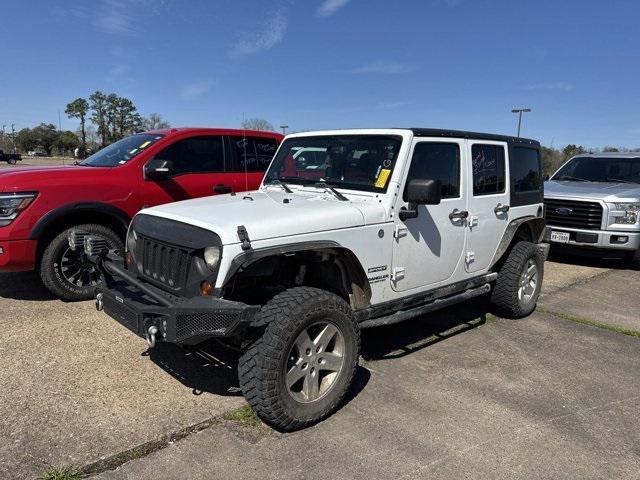 used 2013 Jeep Wrangler Unlimited car, priced at $13,658