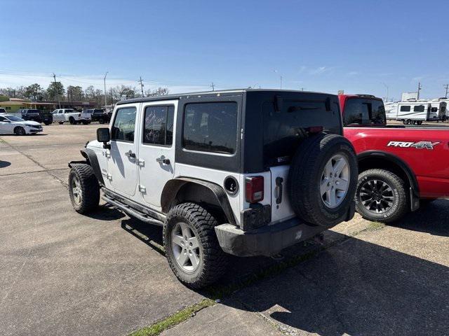 used 2013 Jeep Wrangler Unlimited car, priced at $13,658