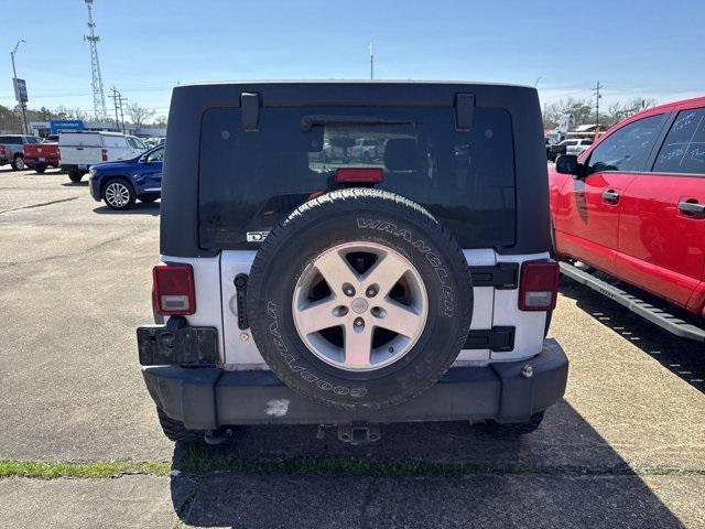 used 2013 Jeep Wrangler Unlimited car, priced at $13,658