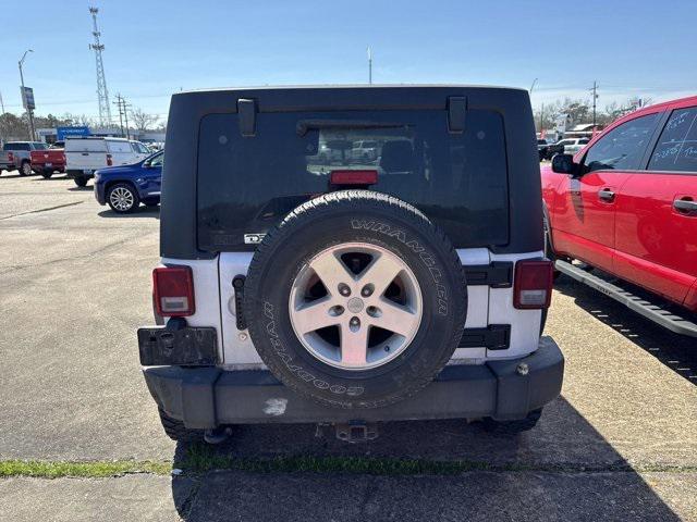 used 2013 Jeep Wrangler Unlimited car, priced at $13,658