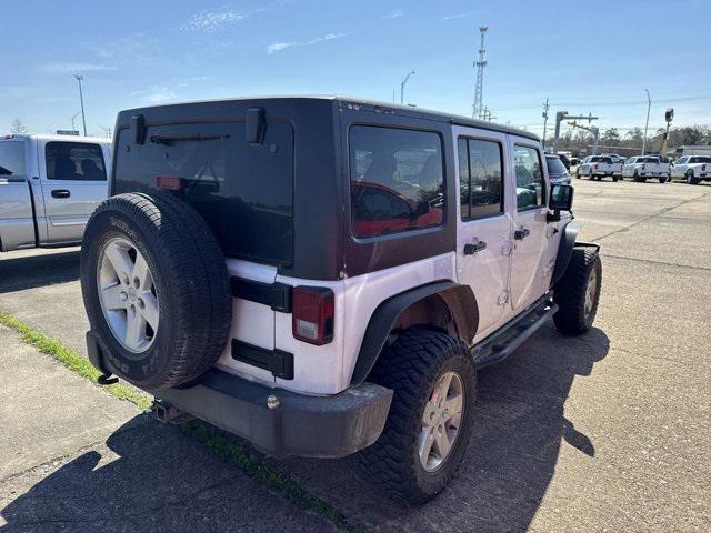 used 2013 Jeep Wrangler Unlimited car, priced at $13,658