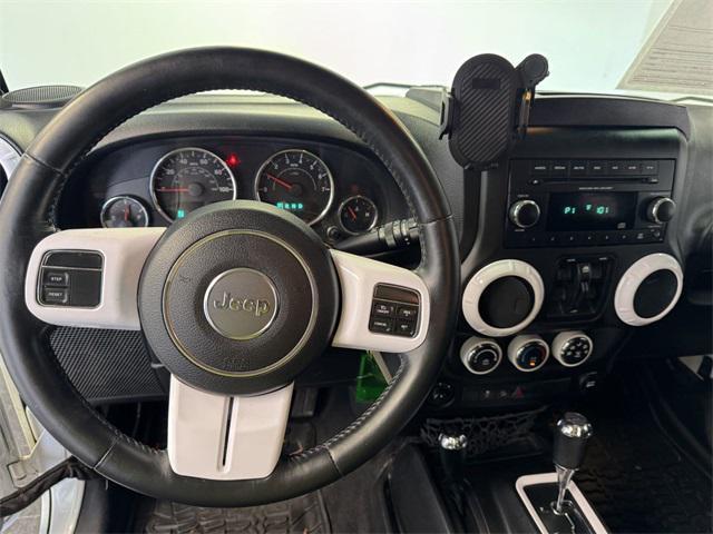 used 2015 Jeep Wrangler Unlimited car, priced at $18,795