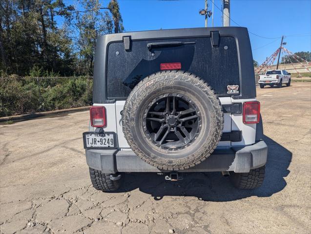 used 2015 Jeep Wrangler Unlimited car, priced at $21,575