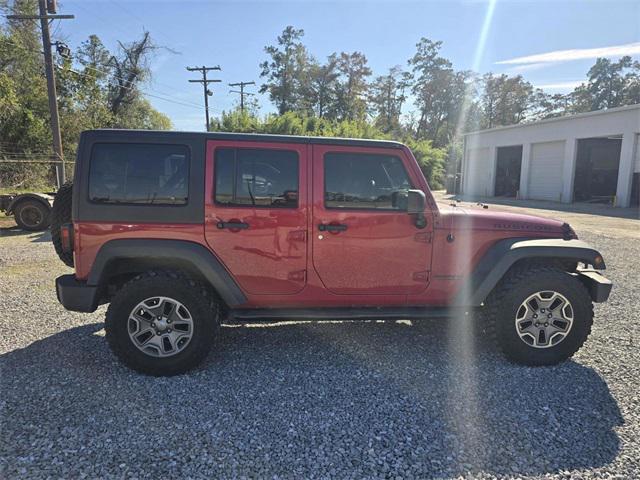 used 2014 Jeep Wrangler Unlimited car, priced at $16,368