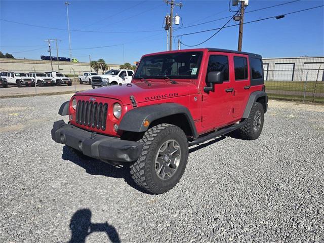 used 2014 Jeep Wrangler Unlimited car, priced at $16,368