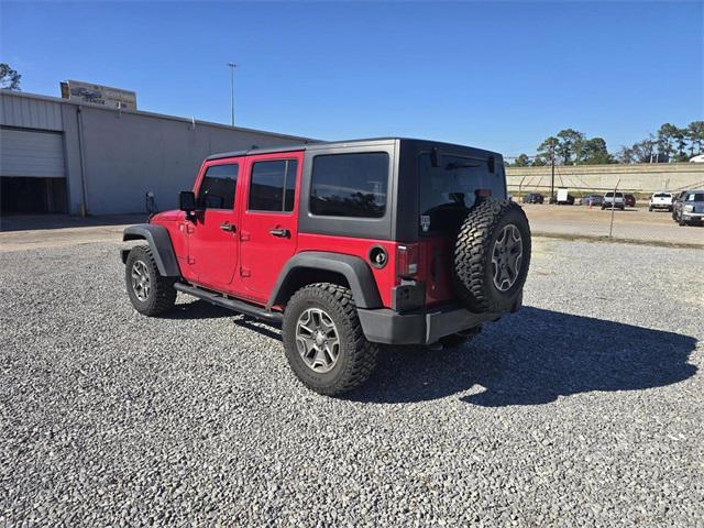 used 2014 Jeep Wrangler Unlimited car, priced at $16,368