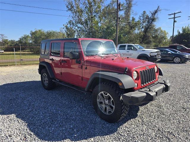 used 2014 Jeep Wrangler Unlimited car, priced at $16,368