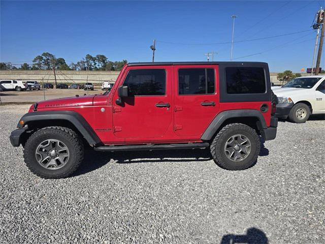 used 2014 Jeep Wrangler Unlimited car, priced at $16,368