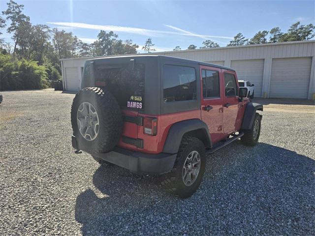 used 2014 Jeep Wrangler Unlimited car, priced at $16,368