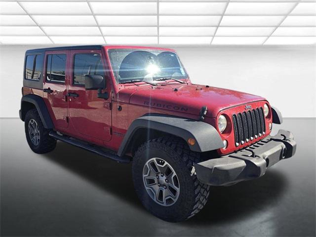 used 2014 Jeep Wrangler Unlimited car, priced at $16,368