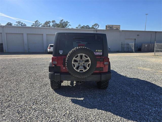 used 2014 Jeep Wrangler Unlimited car, priced at $16,368