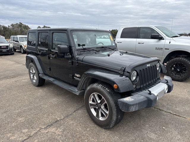 used 2015 Jeep Wrangler Unlimited car, priced at $21,345