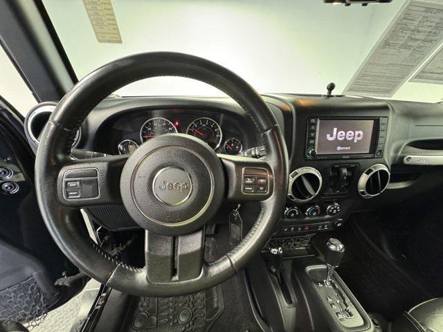 used 2015 Jeep Wrangler Unlimited car, priced at $20,095