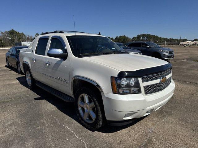 used 2013 Chevrolet Avalanche car, priced at $16,559