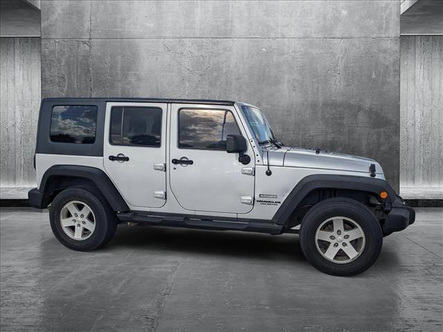 used 2010 Jeep Wrangler Unlimited car, priced at $13,898