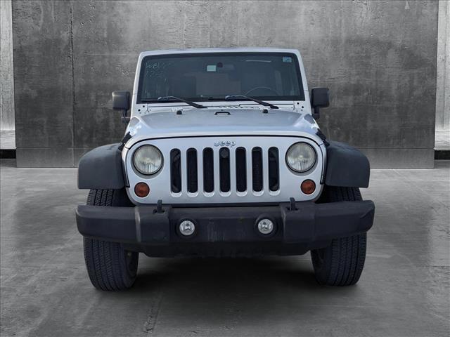 used 2010 Jeep Wrangler Unlimited car, priced at $13,898