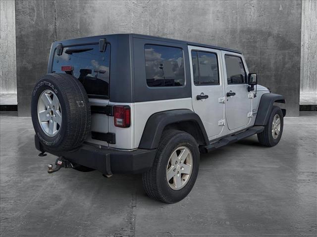 used 2010 Jeep Wrangler Unlimited car, priced at $13,898