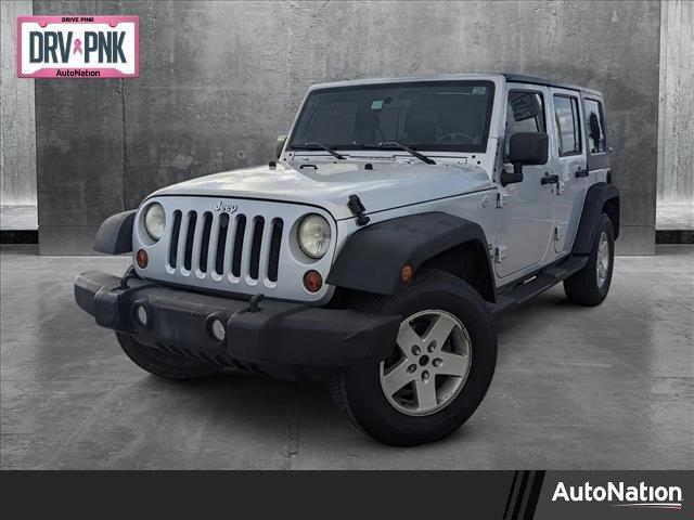 used 2010 Jeep Wrangler Unlimited car, priced at $13,898