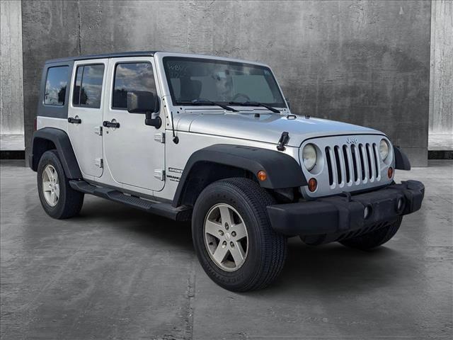 used 2010 Jeep Wrangler Unlimited car, priced at $13,898