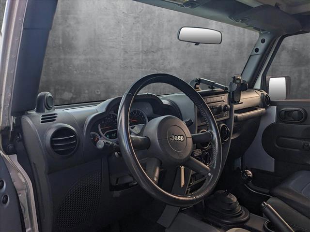 used 2010 Jeep Wrangler Unlimited car, priced at $13,898