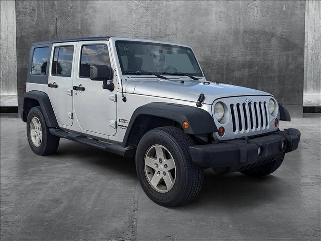 used 2010 Jeep Wrangler Unlimited car, priced at $13,898