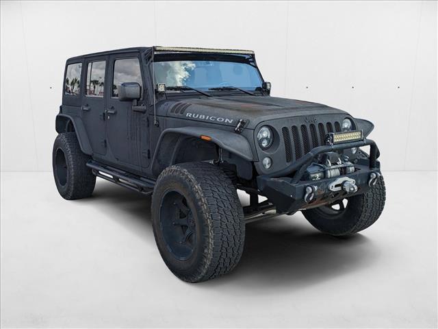 used 2015 Jeep Wrangler Unlimited car, priced at $19,598