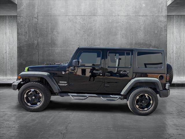 used 2013 Jeep Wrangler Unlimited car, priced at $18,991