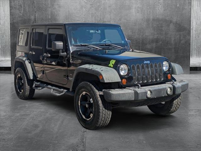 used 2013 Jeep Wrangler Unlimited car, priced at $18,991