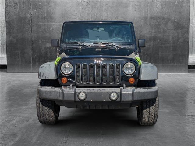 used 2013 Jeep Wrangler Unlimited car, priced at $18,991