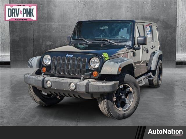 used 2013 Jeep Wrangler Unlimited car, priced at $18,991