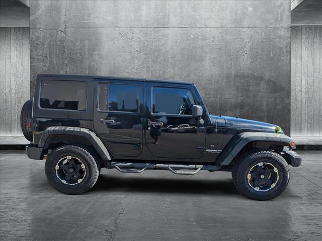 used 2013 Jeep Wrangler Unlimited car, priced at $18,991