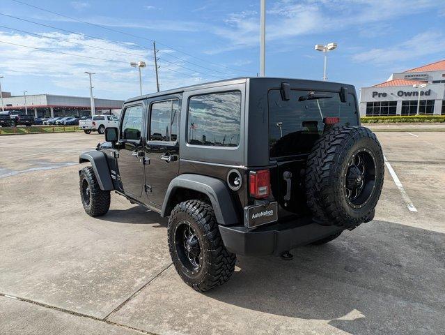 used 2016 Jeep Wrangler Unlimited car, priced at $21,991