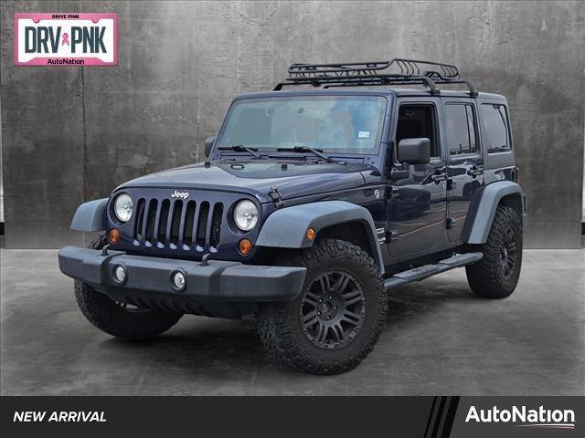 used 2013 Jeep Wrangler Unlimited car, priced at $20,589