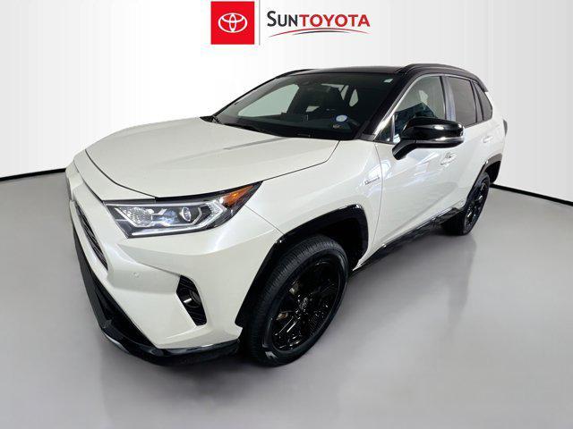 used 2021 Toyota RAV4 Hybrid car, priced at $29,979