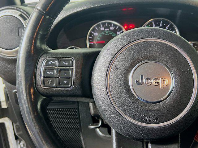 used 2015 Jeep Wrangler Unlimited car, priced at $16,972