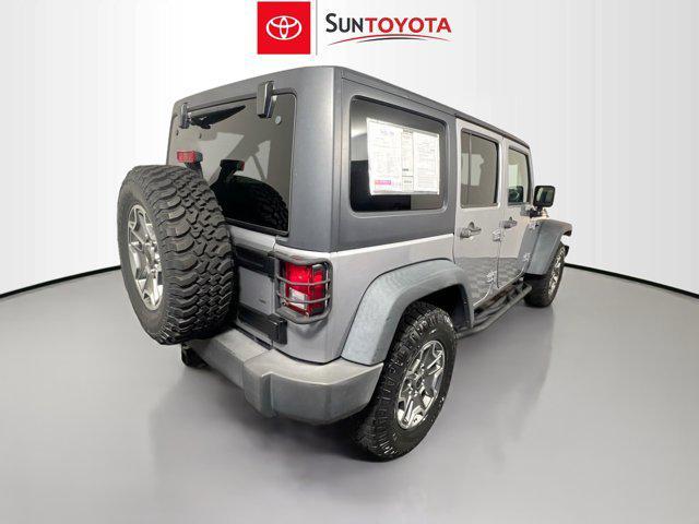 used 2015 Jeep Wrangler Unlimited car, priced at $16,972