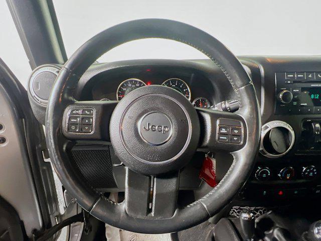 used 2015 Jeep Wrangler Unlimited car, priced at $16,972