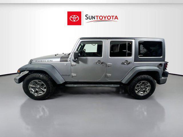 used 2015 Jeep Wrangler Unlimited car, priced at $16,972