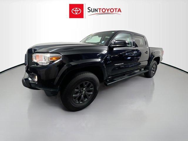 used 2021 Toyota Tacoma car, priced at $27,589