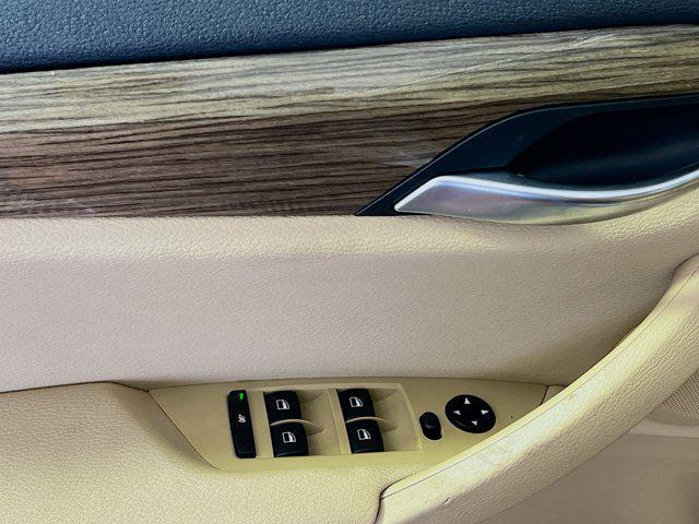used 2013 BMW X1 car, priced at $13,425