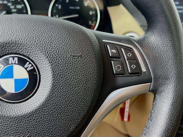 used 2013 BMW X1 car, priced at $13,425