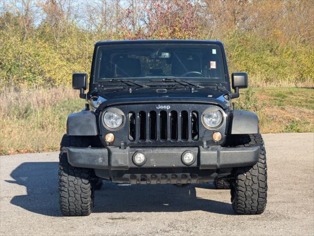 used 2018 Jeep Wrangler JK car, priced at $27,551